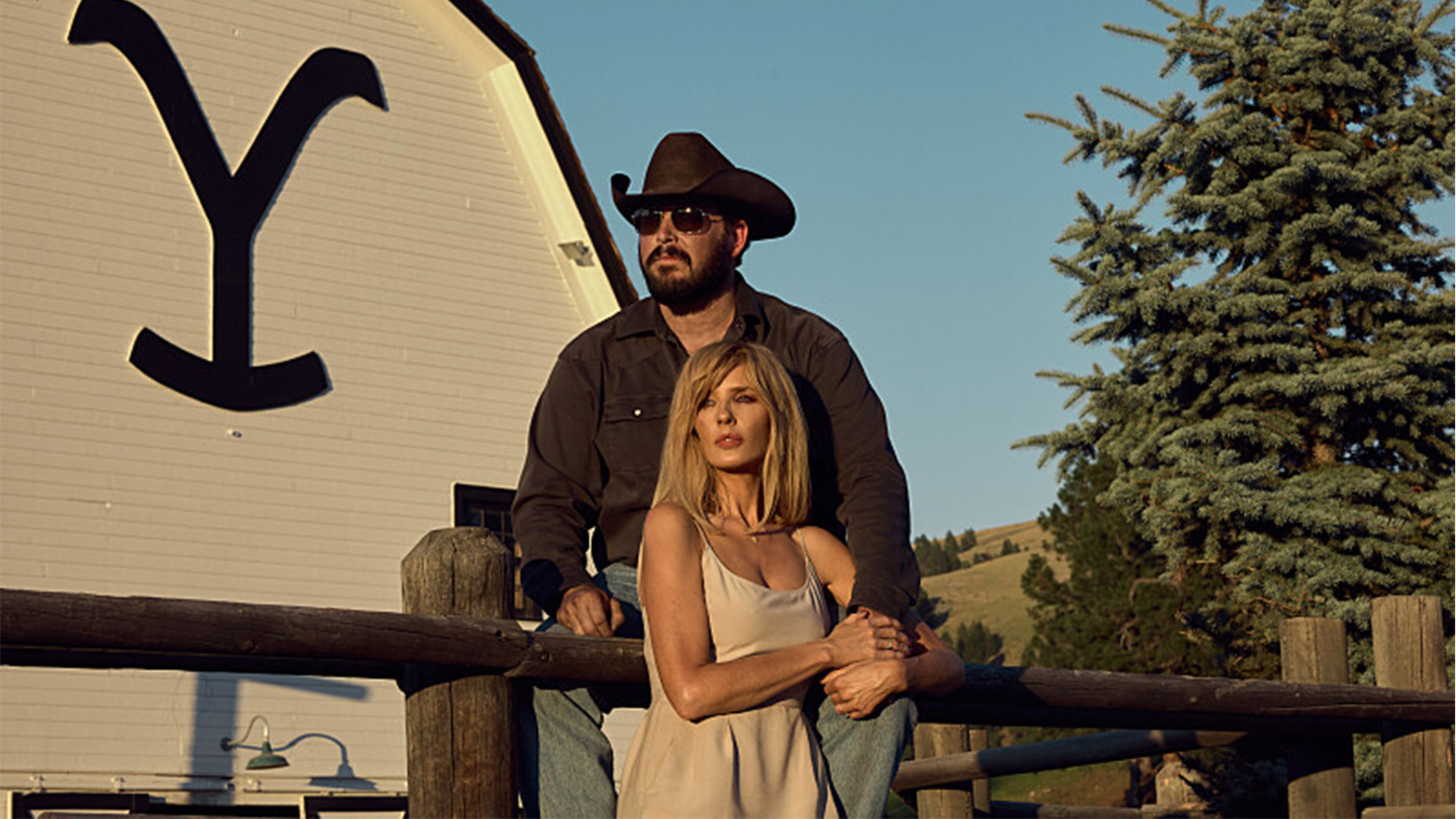 Rip Wheeler and Beth Dutton are outside a ranch together in Yellowstone season.
