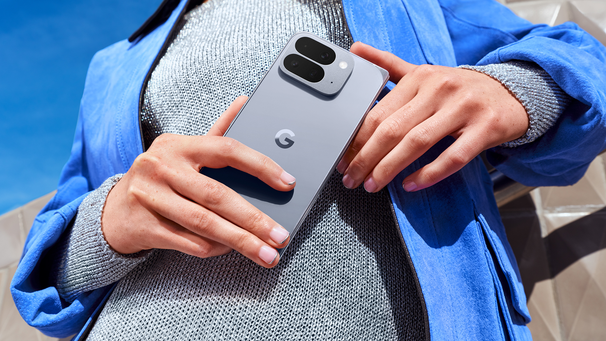 Two hands holding the Google Pixel 10 Pro fold phone