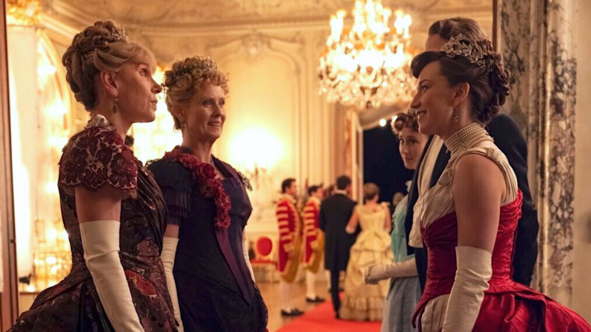 Agnes and Ada talk to George and Bertha in a ball