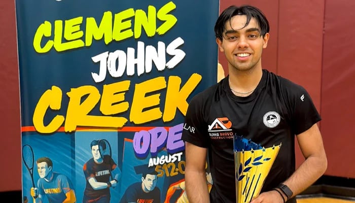 Pakistan's Squash player, Ashab Irfan, poses with the trophy after winning the Johns Creek Open in the United States on August 18, 2025. - Reporter