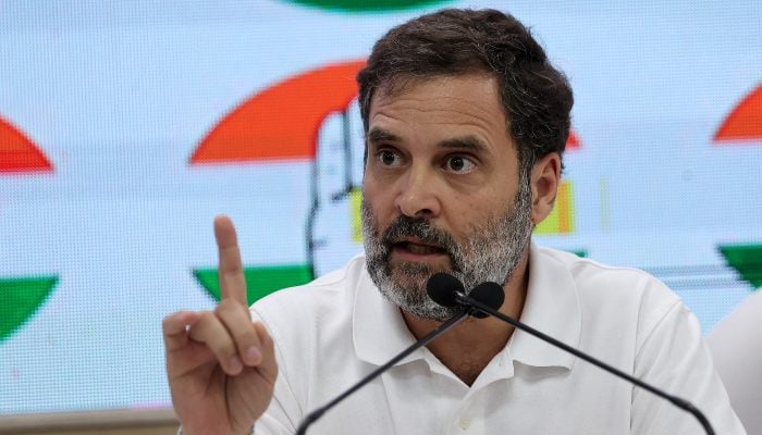 Rahul Gandhi, main leader of the Congress Party of the Main Opposition of Indies, makes gestures while heading to the media at the headquarters of the Congress in New Delhi, India, October 9, 2023. - Reuters