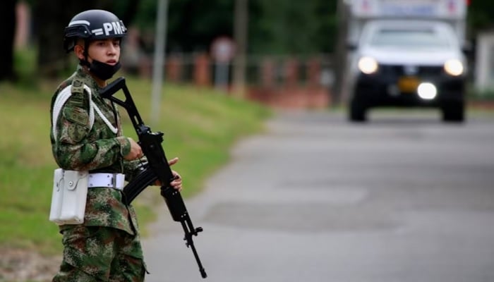 A patrol soldier around a military battalion where a car bomb exploded, according to the authorities, in Cucuta, Colombia, USA, June 15, 2021. - Reuters