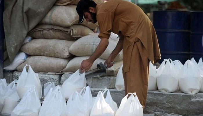 You can see a person by placing sugar in a plastic shopping bag while paste. - AFP/file