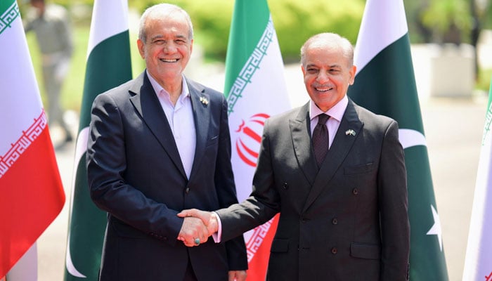 PM Shehbaz (right) receives Iranian president at Prime Minister's house in Islamabad on August 3, 2025. - ask