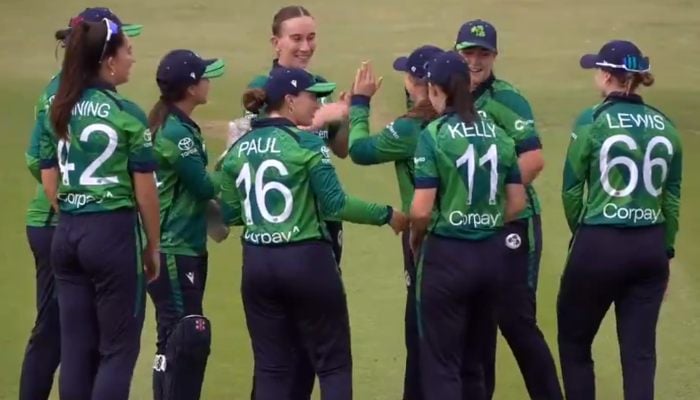 Screengrab shows Ireland Orla Prentergast (Top, Centro) celebrates with her teammates after fire Pakistans Muneeba Ali during her first T20I at the Clotarf Cricket Club in Dublin on August 6, 2025. - x/@Crickeirell