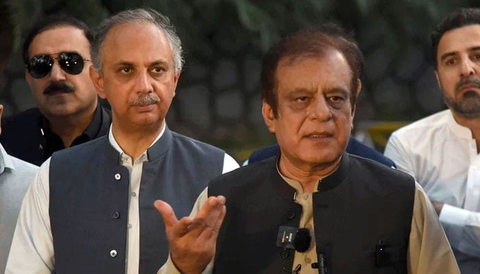 PTI Omar Ayub and Shibli Faraz leaders talk to the media at the Khyber Pakhtunkhwa house in Islamabad on May 6, 2024. - Online
