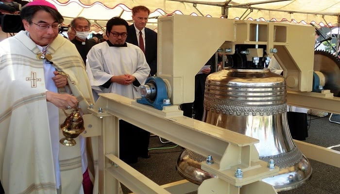 Archbishop Michiaki Nakamura blesses the newly donated