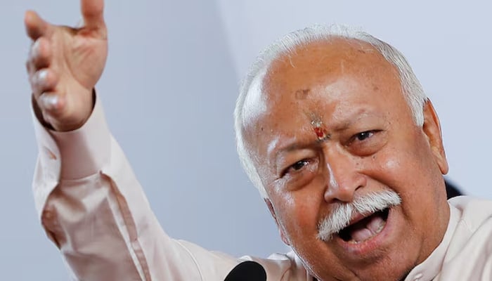 Mohan Bhagwat, head of the Hindu nationalist organization Rashtriya Swayamsevak Sangh (RSS), gestures while heading to a press conference in New Delhi, India November 9, 2019. - Reuters