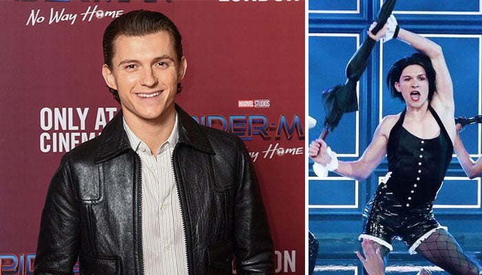 Tom Holland checks the performance of the viral umbrella