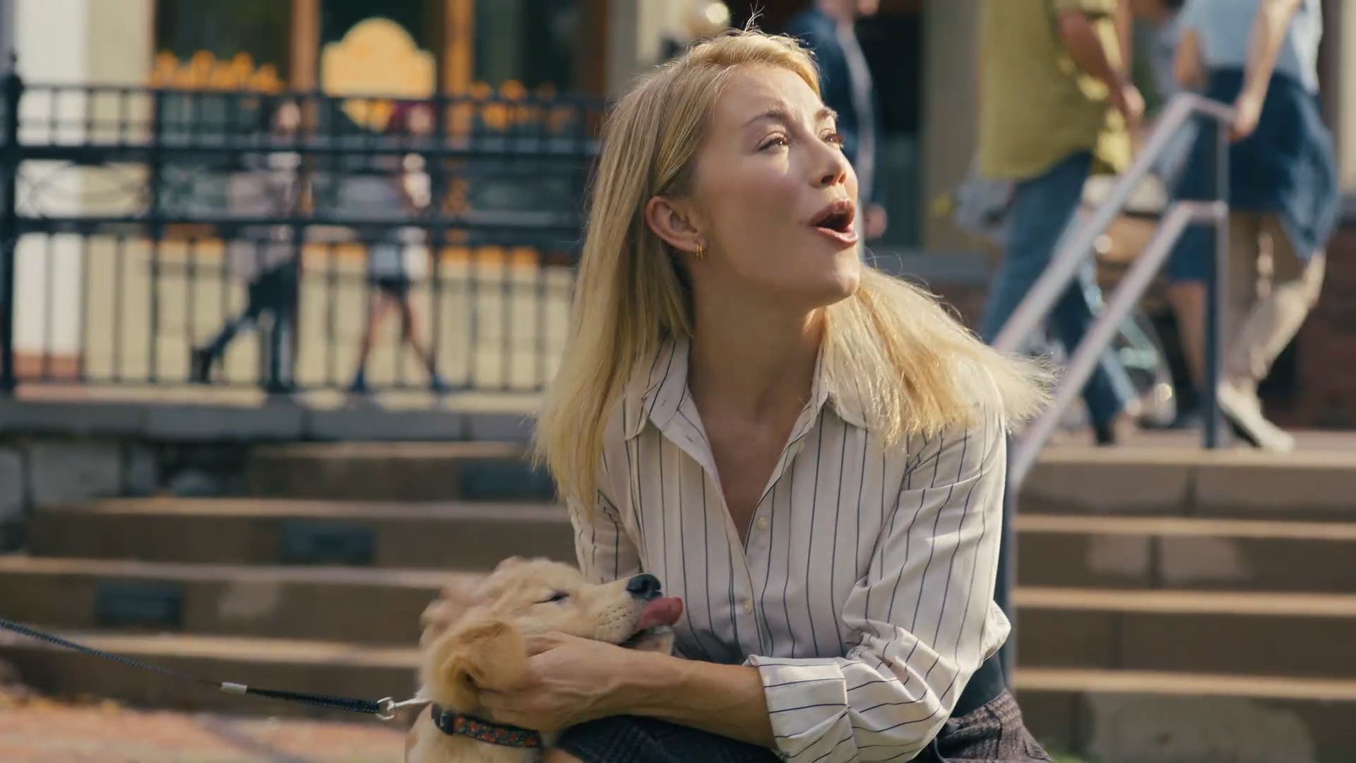Emilia Harcourt 2 stroking a puppy in the peaceful season 2 episode 3