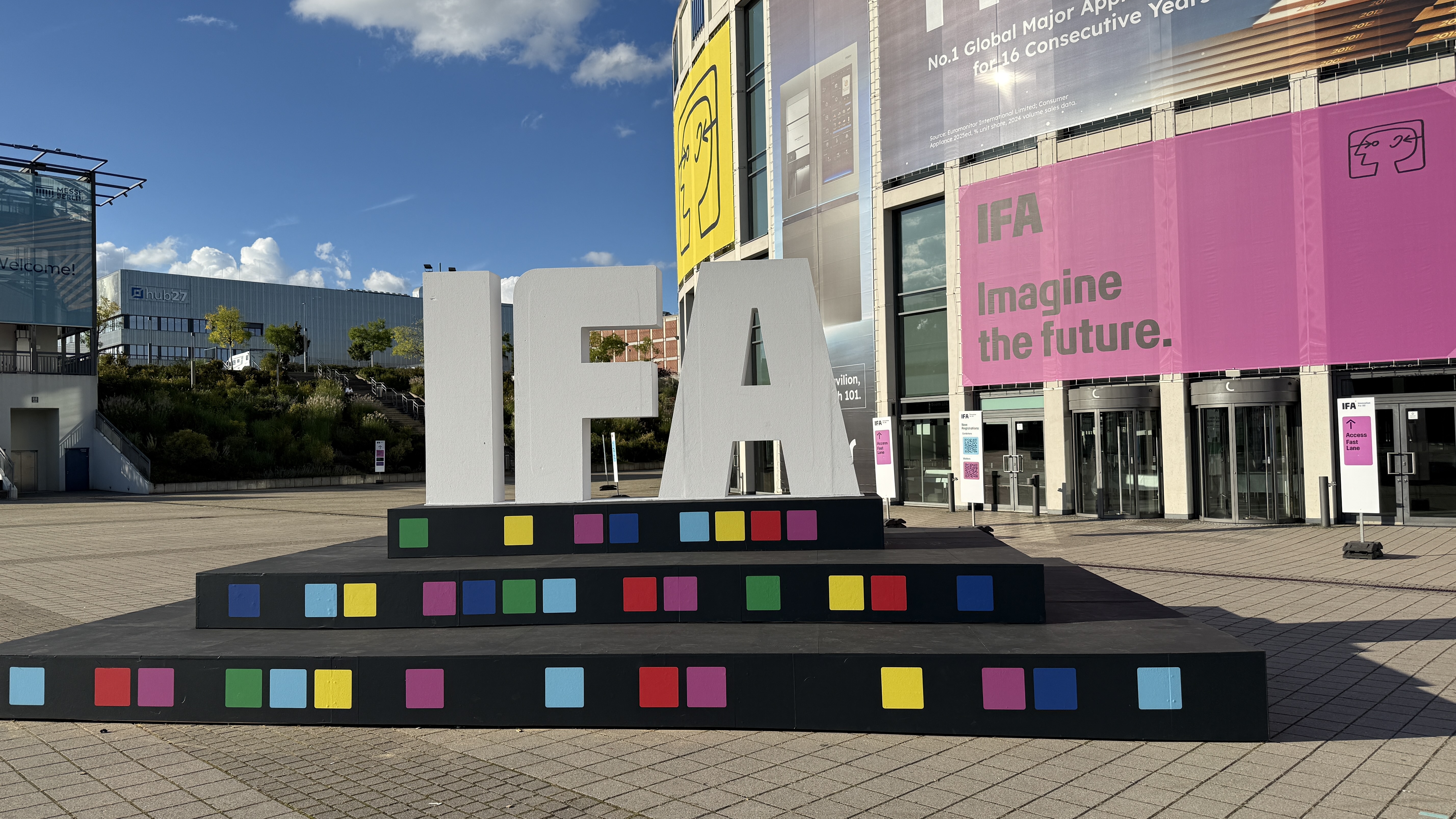 A sign of the IFA logo, with the Berlin Messe complex in the background