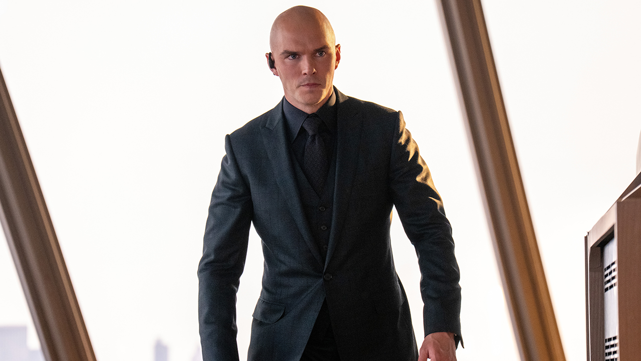 An angry Lex Luthor moving away from a skyscraper window in the 2025 movie '