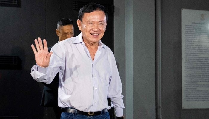 Former Thailand Prime Minister, Thaksin Shinawatra, leaves the headquarters of the Pheu Thai match in Bangkok on August 29, 2025. - AFP