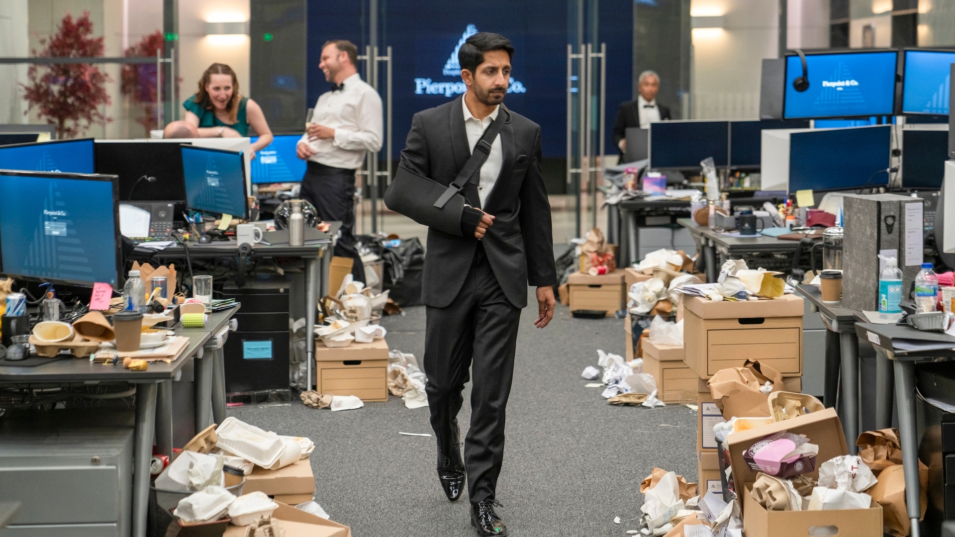 Rishi walks through the offices in season 3 of the industry