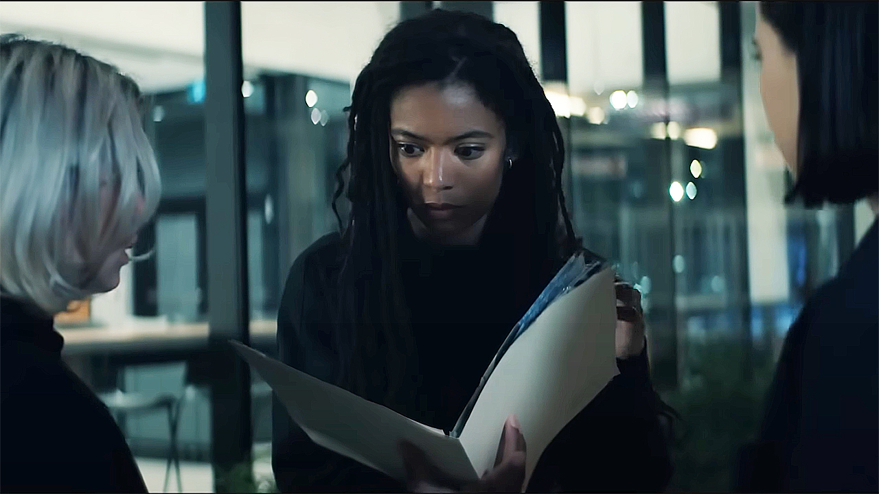 A shock Marie looking at the Odessa project file in the gene V of season 2 episode 2