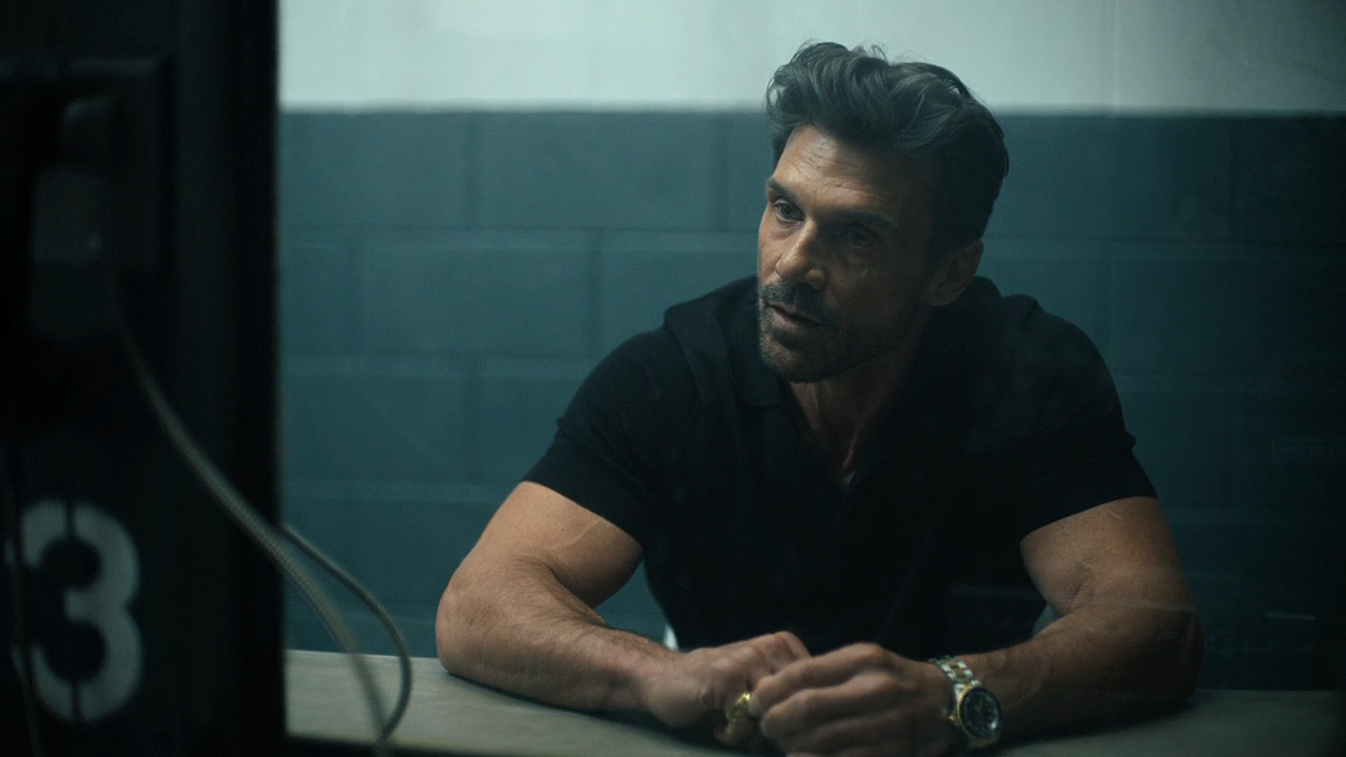 Rick Flag SR looks a bit stressed in a prison visits room in Peacemaker Season 2 Episode 6