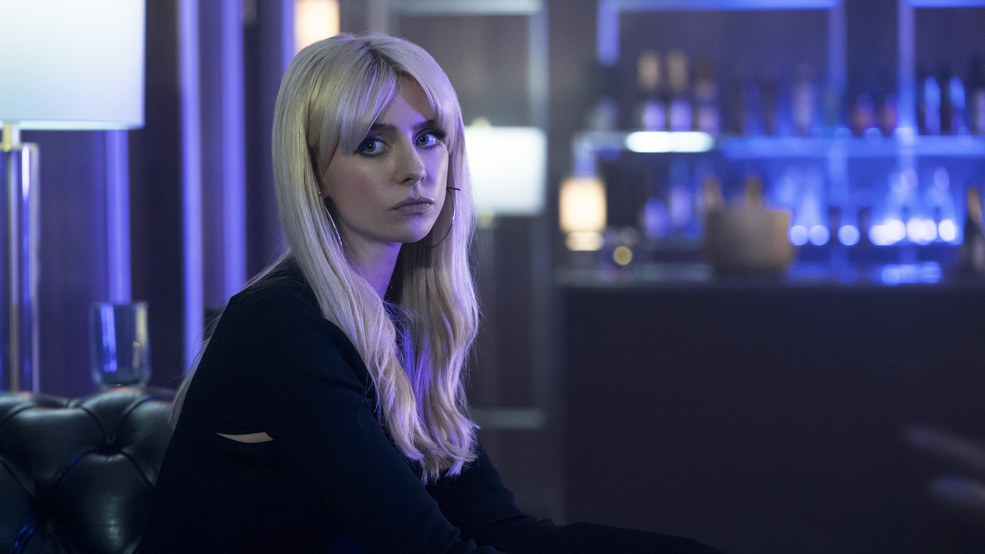 A cate sitting looking at an encryption outside the camera in generation V of season 2 episode 5