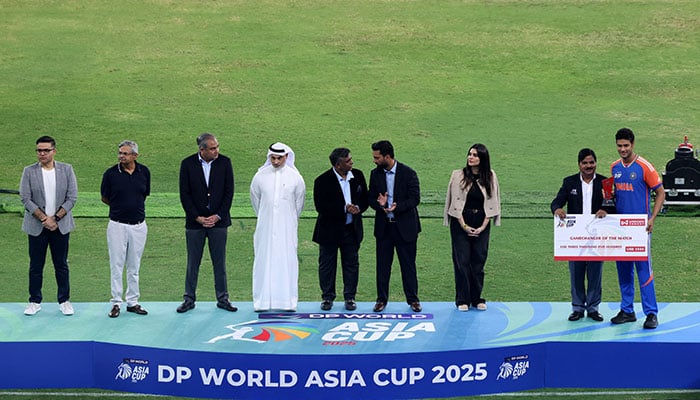 The president of ACC, Mohsin Naqvi, is on the podium with the vice president of the Emirates Cricket Board, Khalid Al Zarooni, before trophy presentations after the final of the Asia Cup at the Dubai International Cricket Stadium, September 28, 2025.