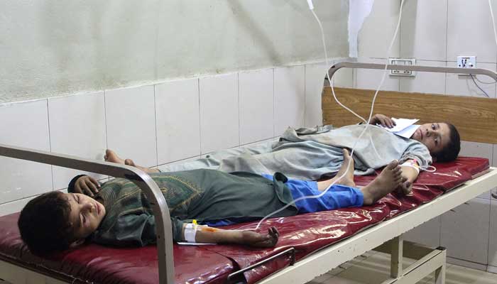 Children receive treatment in a hospital after an earthquake in Afghanistans Jalalabad on September 1, 2025. - AFP