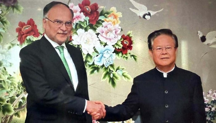 President NDRC Mr. Zheng Shanjie meets with the Federal Minister of Planning and Development and Special Initiatives Ahsan Iqbal in the NDRC Office, Beijing, China, September 26, 2025. - App