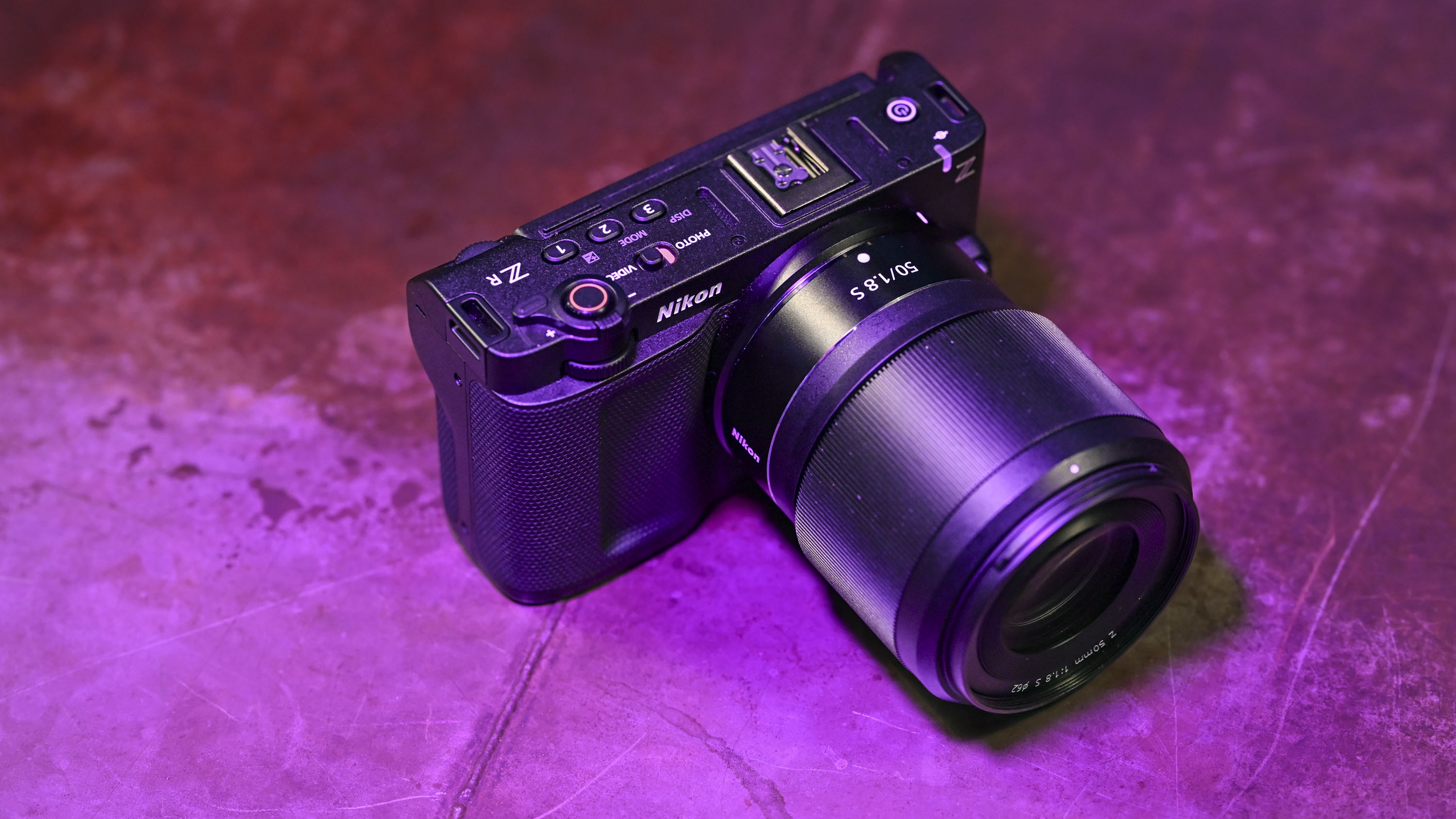 TOP OF NIKON ZR BAJA LOW LOW MAGENT CAMERA
