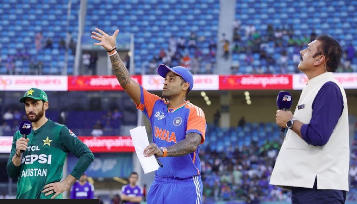 Pakistan's captain, Salman Ali Agha (center) and the captain of India, Suryakumar Yadav at the launch of the Asia 2025s Cup, Super Fours, at the Dubai International Cricket Stadium, Dubai, Eau, on September 14, 2025. -