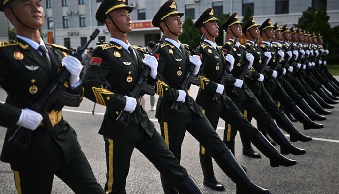 Chinese military personnel participate in an essay before a vast parade on September 3, 2025 in Beijing. - AFP