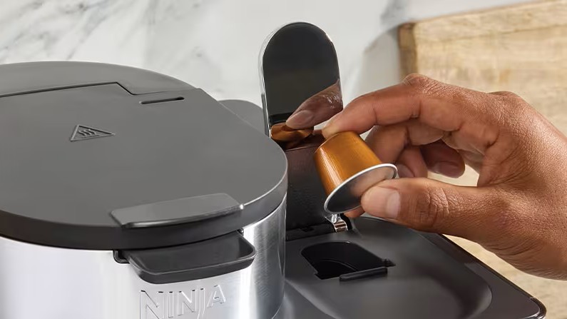 Capsule person in the Dualbrew Ninja machine