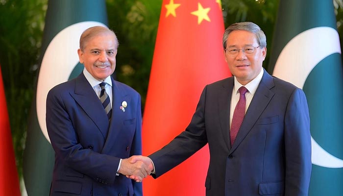 PM Shehebaz Sharif (Left) meets Chinese Prime Minister Li Qiang in Beijing on September 4, 2025. - ask