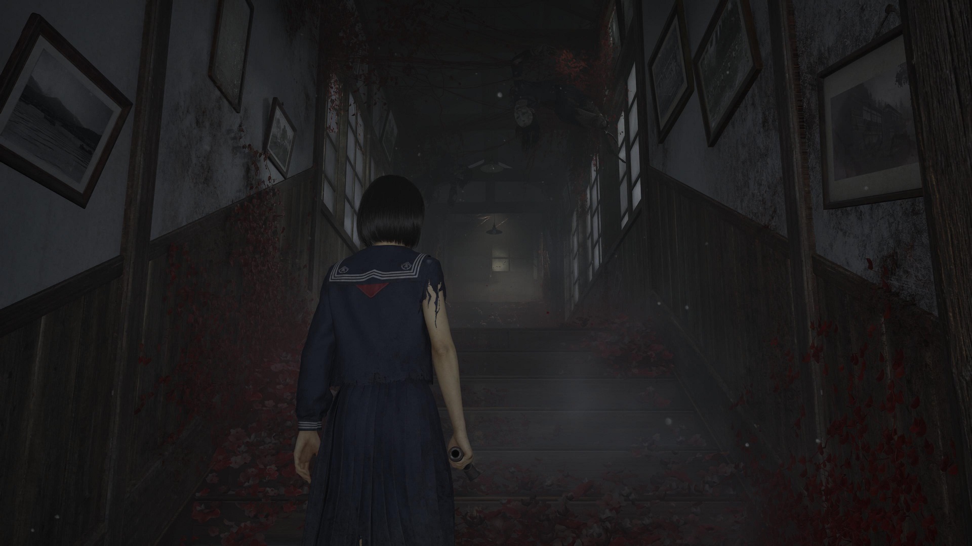 Hinako walking through an old school at Silent Hill F
