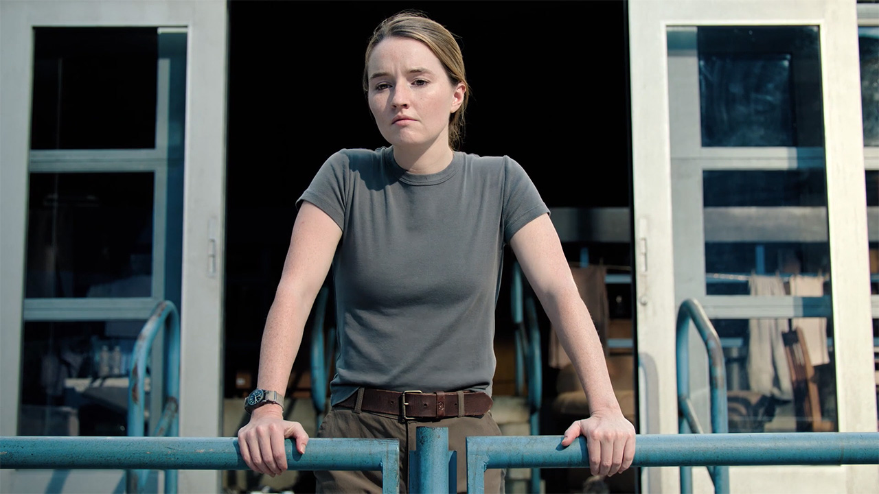 Abby standing on a balcony in episode 7 of season 2 of us