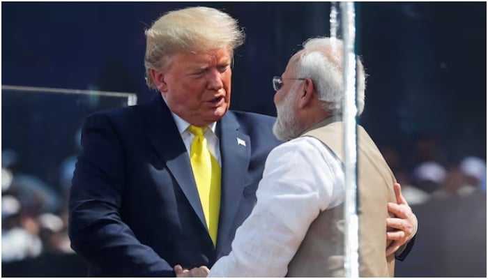 The president of the United States, Donald Trump, embraces with Indian Prime Minister Narendra Modi during the Namaste Trump event at the Sardar Patel Gujarat stadium, in Ahmedabad, India, February 24, 2020.