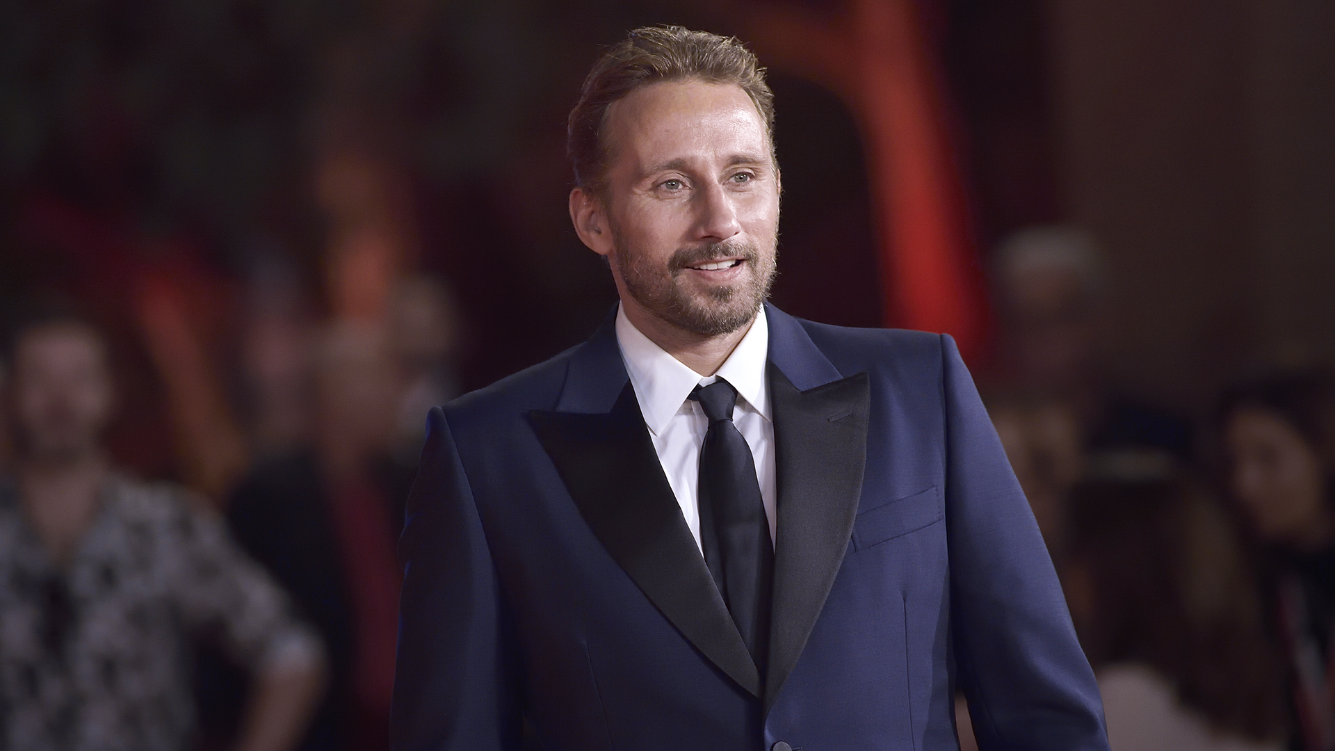 Matthias Schoenerts publishing for photographs at the Rome 2022 Film Festival