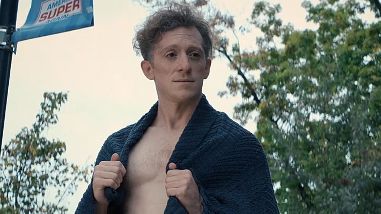 Thomas Godolkin looking at someone off camera in Gen V season 2 episode 7