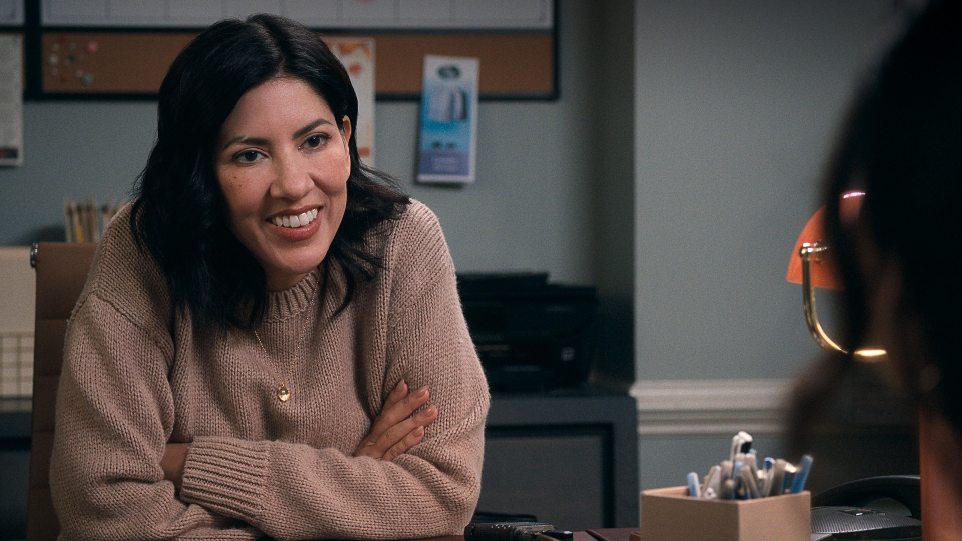 Didi smiles in the second season of A Man on the Inside