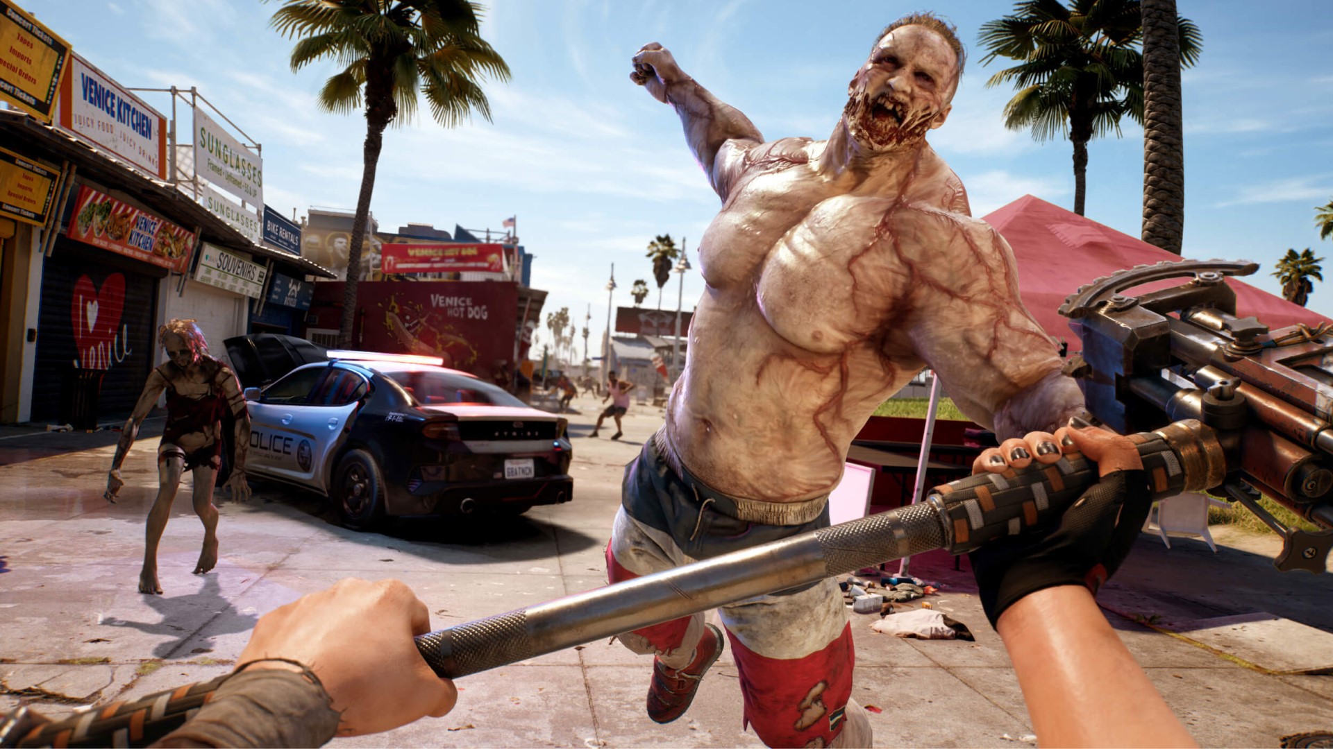 Dead Island 2 screenshot with a hammer and a huge zombie