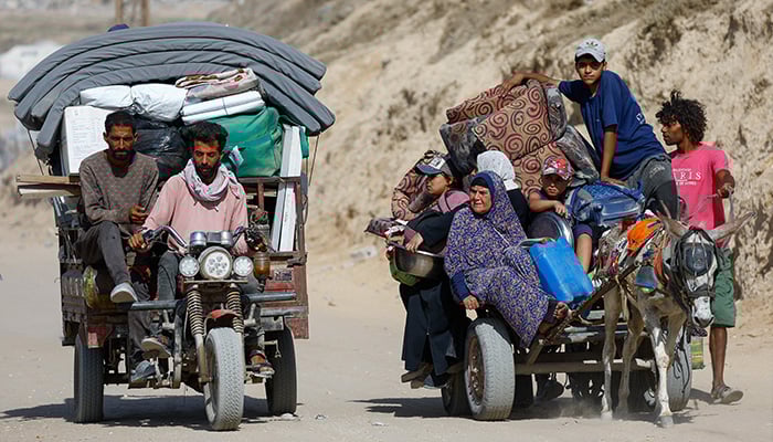 The displaced Palestinians fleeing from northern Gaza due to an Israeli military operation, move south after the orders of Israeli forces to leave the city of Gaza, in the Central Strip of Gaza on October 3, 2025. - Reuters -