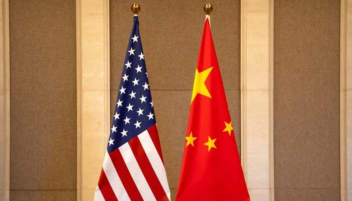 U.S. and Chinese flags are placed before a meeting between U.S. Treasury Secretary Janet Yellen and Chinese Vice Premier He Lifeng at the Diaoyutai State Pension in Beijing, China, Saturday, July 8, 2023. –Reuters