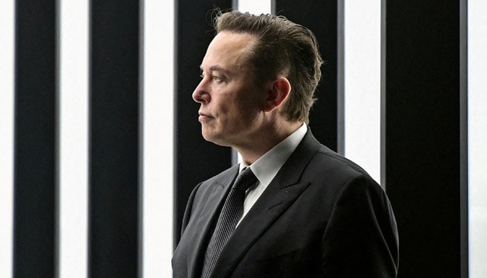 Elon Musk attends the opening ceremony of the new Tesla Gigafactory for electric cars in Gruenheide, Germany, March 22, 2022. - Reuters