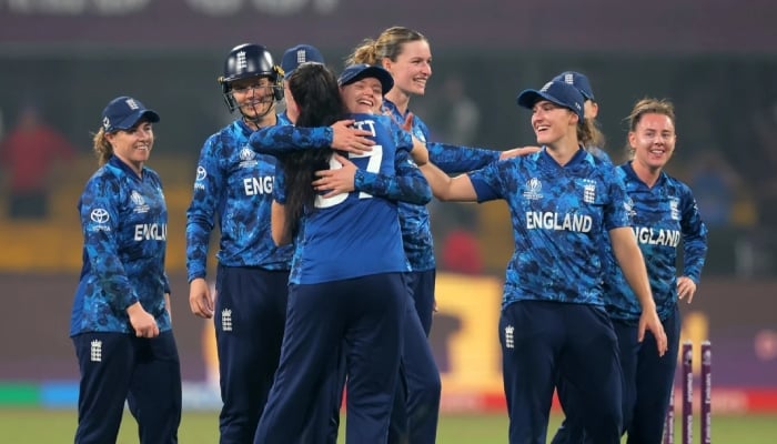 England players celebrate after qualifying for the semi-final of the Women's World Cup 2025 with a four-run win against India at the Holkar Cricket Stadium, Indore, on October 19, 2025. – ICC