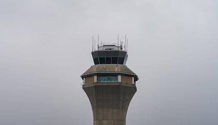 The air traffic control tower at Newark Liberty International Airport is seen in Newark, New Jersey, U.S., May 9, 2025. – Reuters
