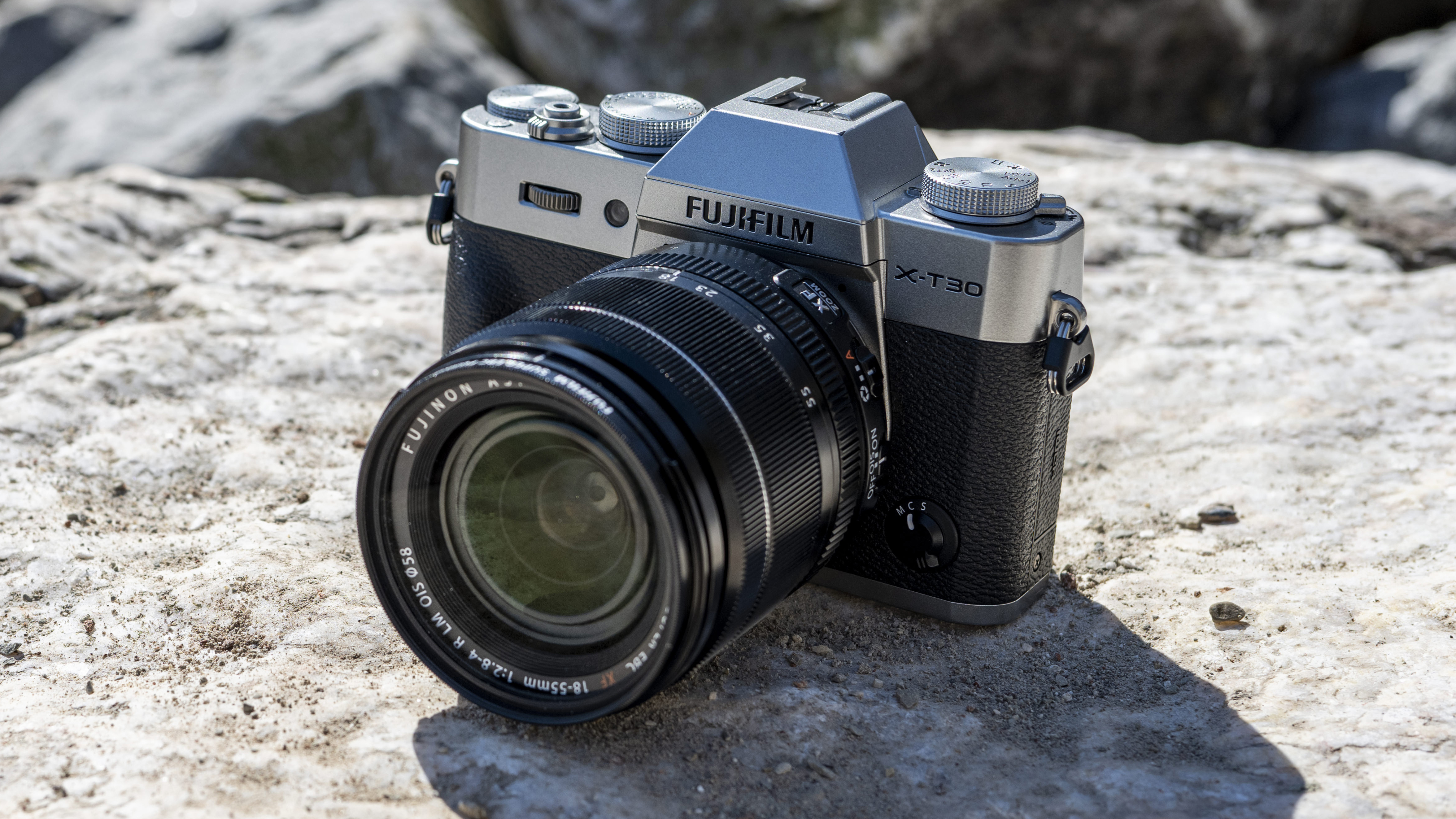 The Fujifilm X-T30 II resting on a rock