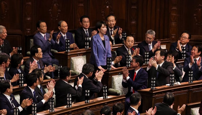 Leader of Japan's ruling Liberal Democratic Party (LDP) Sanae Takaichi reacts as she receives applause after being elected prime minister, in the Lower House of Parliament in Tokyo, Japan, October 21, 2025. – Reuters