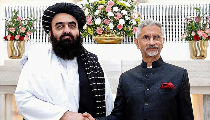 This photo taken and released by the Indian Ministry of External Affairs on October 10, 2025 shows Indian Foreign Minister Subrahmanyam Jaishankar (right) and his Afghan counterpart Amir Khan Muttaqi shaking hands during a bilateral meeting in New Delhi. —AFP