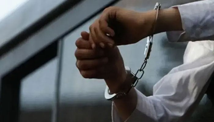 A file photograph of a pair of handcuffs. — Reuters/Archive