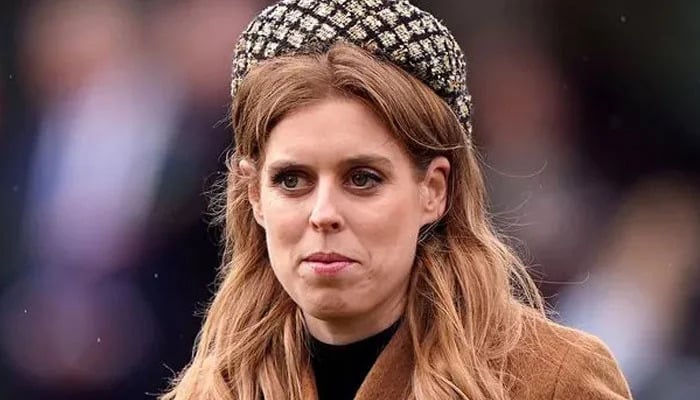 Princess Beatrice puts on a poker face to show her bravery