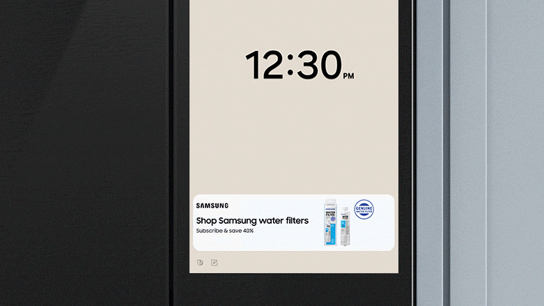 A Samsung smart refrigerator displaying an advertisement