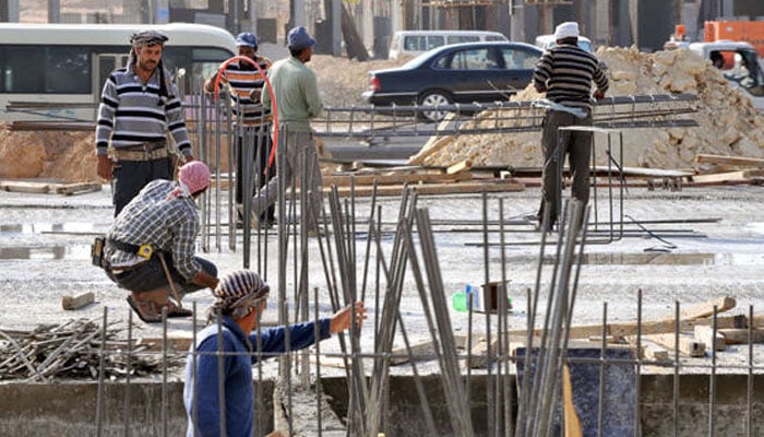 Workers work at a construction site in the Saudi capital Riyadh. — AFP/Archive