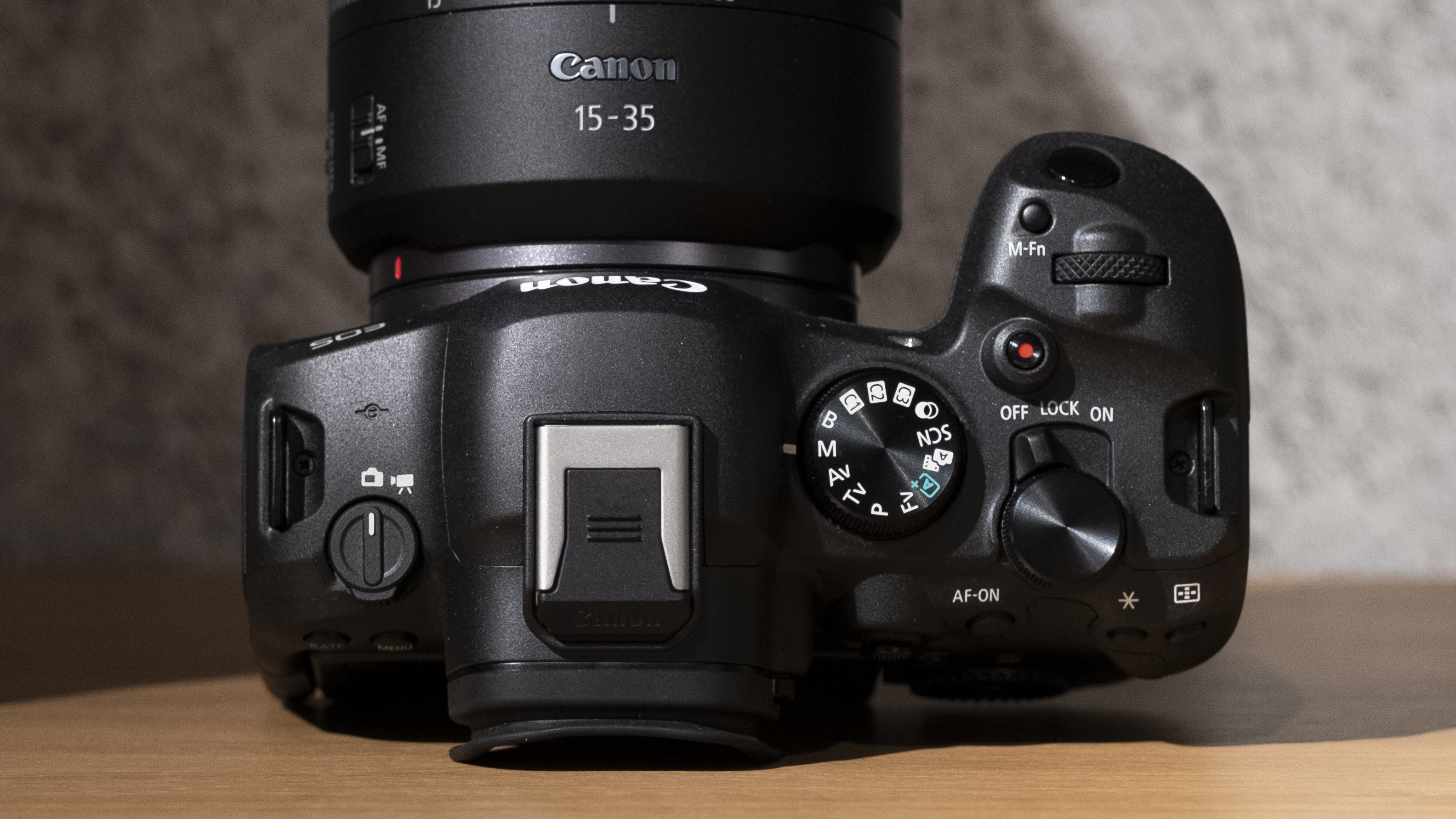 Canon EOS R6 Mark II camera on a wooden shelf