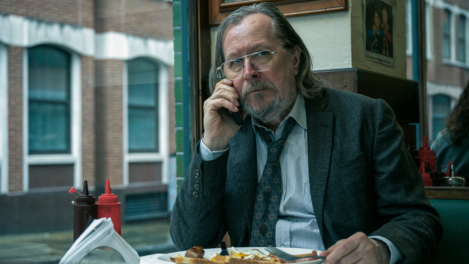 Jackson Lamb Receives a Phone Call While Eating on Slow Horses Season 5